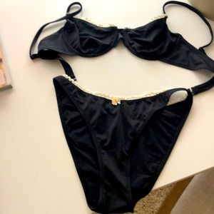 Solid & Stripe black 2 piece swim suit. Top M Bottom L